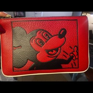 Coach Mickey Mouse fine leather wrist band purse.